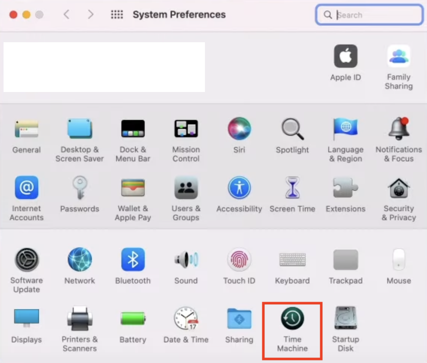 Select Time Machine under System Preferences